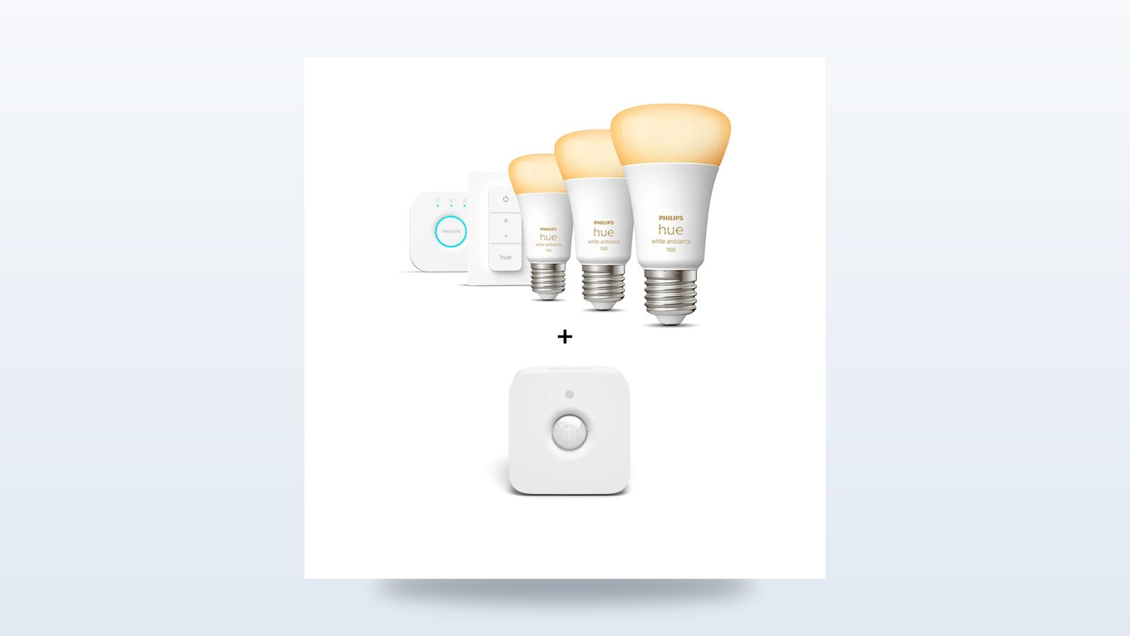 Drei Philips-Hue-Lampen mit Bewegungsmelder vor hellem Hintergrund